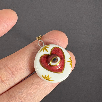 Handmade ceramic necklace, Evil Eye ceramic pendant series, natural boho style, rustic nature-inspired design.