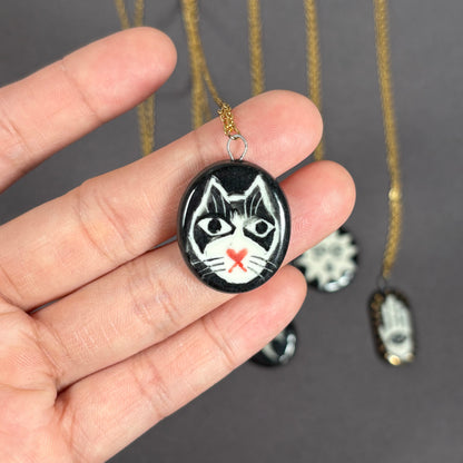 Handmade ceramic necklace, black ceramic pendant series, natural boho style, rustic nature-inspired design.