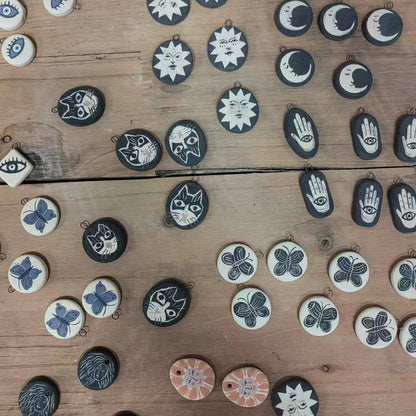 Handmade ceramic necklace, black ceramic pendant series, natural boho style, rustic nature-inspired design.