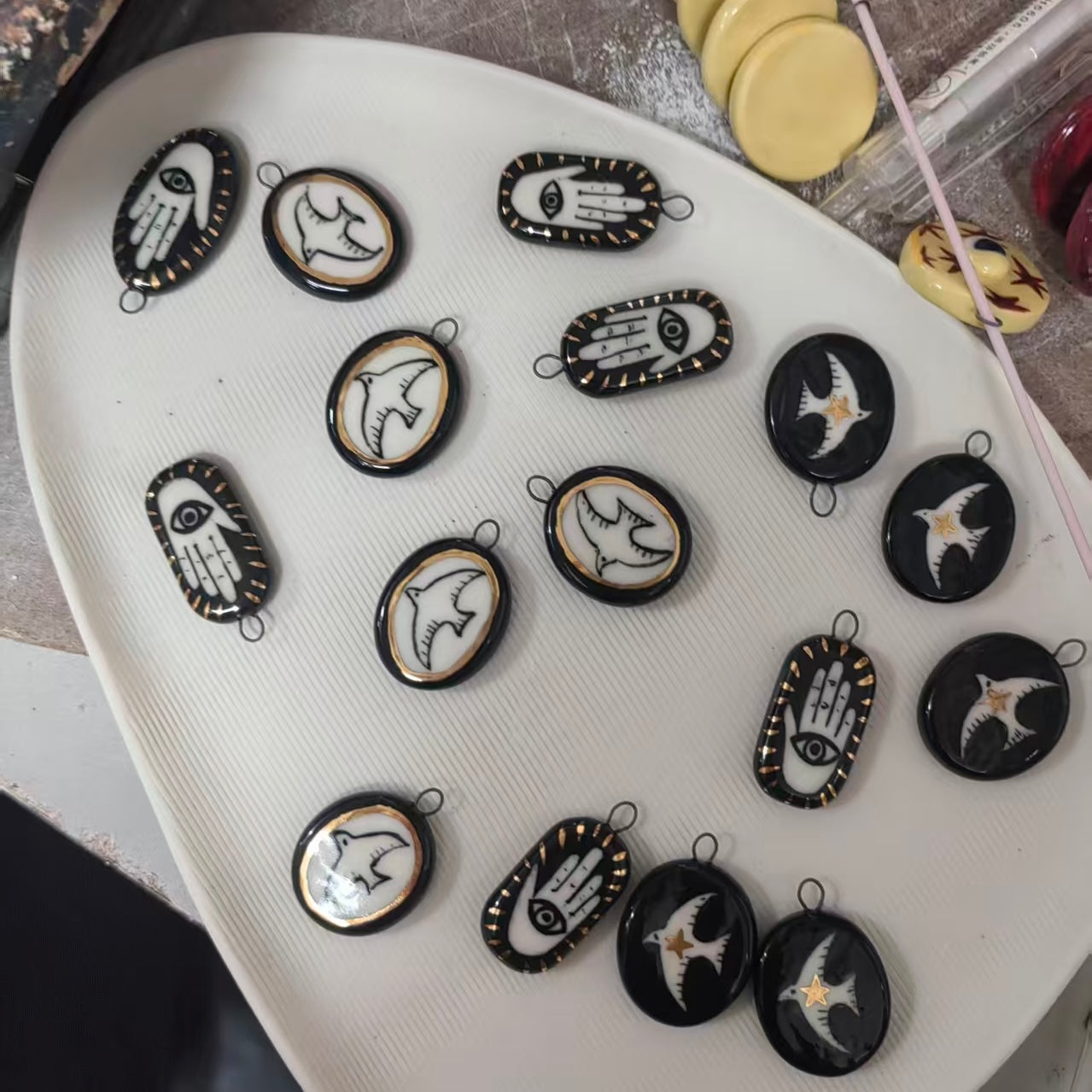 Handmade ceramic necklace, black ceramic pendant series, natural boho style, rustic nature-inspired design.