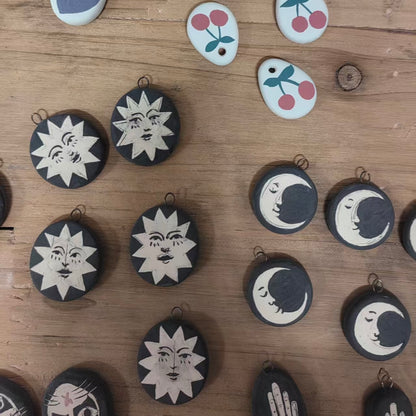 Handmade ceramic necklace, black ceramic pendant series, natural boho style, rustic nature-inspired design.