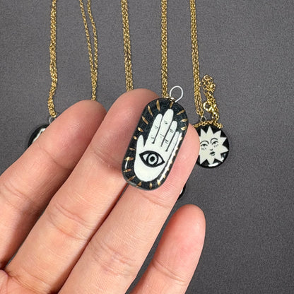 Handmade ceramic necklace, black ceramic pendant series, natural boho style, rustic nature-inspired design.