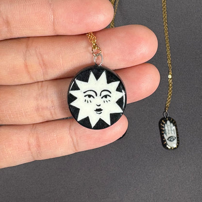 Handmade ceramic necklace, black ceramic pendant series, natural boho style, rustic nature-inspired design.