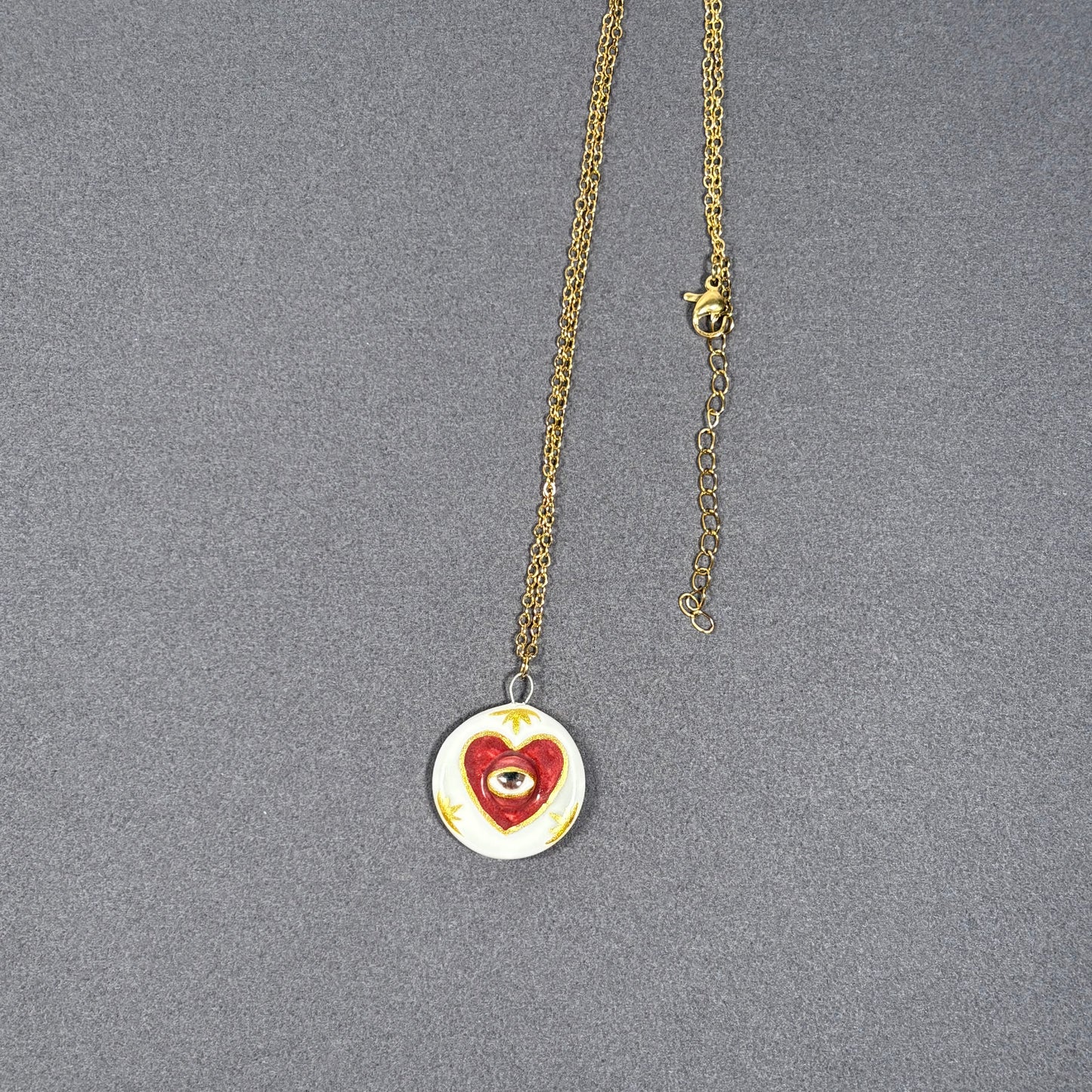 Handmade ceramic necklace, Evil Eye ceramic pendant series, natural boho style, rustic nature-inspired design.