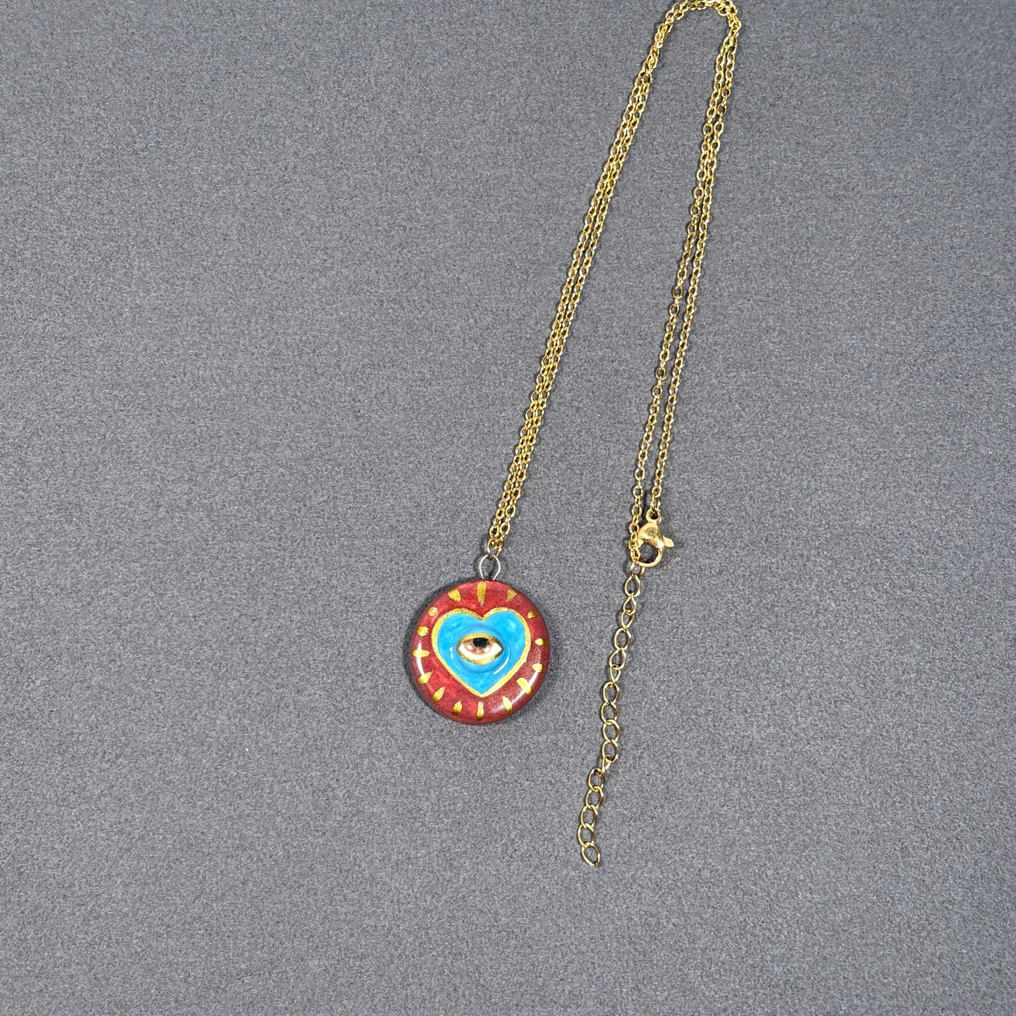 Handmade ceramic necklace, Evil Eye ceramic pendant series, natural boho style, rustic nature-inspired design.