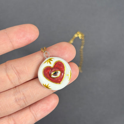 Handmade ceramic necklace, Evil Eye ceramic pendant series, natural boho style, rustic nature-inspired design.