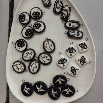 Handmade ceramic necklace, black ceramic pendant series, natural boho style, rustic nature-inspired design.