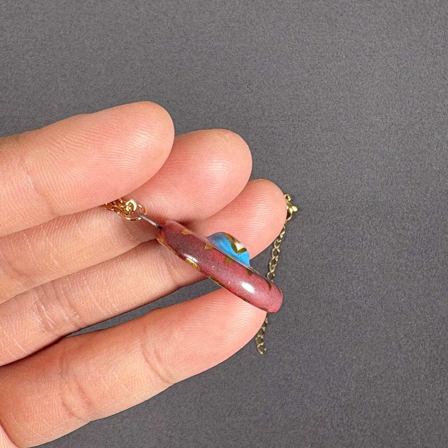 Handmade ceramic necklace, Evil Eye ceramic pendant series, natural boho style, rustic nature-inspired design.