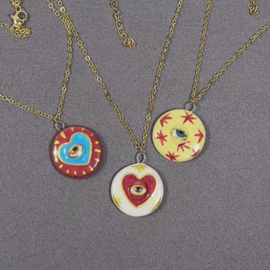 Handmade ceramic necklace, Evil Eye ceramic pendant series, natural boho style, rustic nature-inspired design.